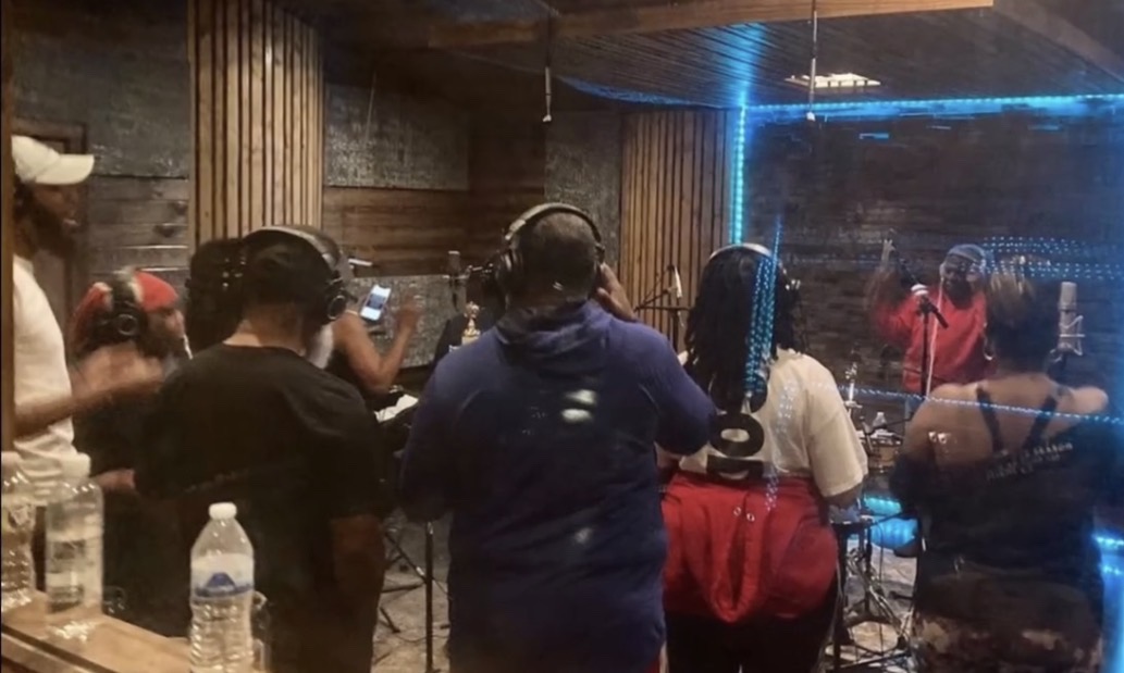 Vocalists collaborating in the studio